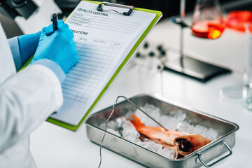 Fish Quality Control- Food Safety Inspector Searching for the Presence Heavy Metals in Wild-Caught...