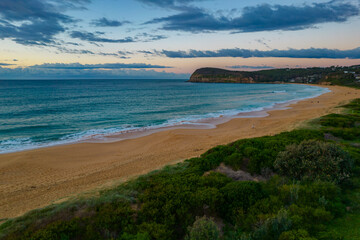 Aerial sunrise seascape with clouds