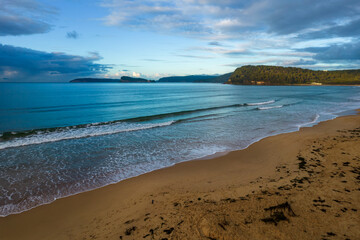 Rain Clouds and Sunrise at the Beach