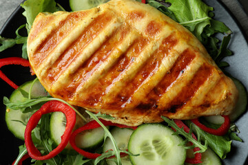 Tasty salad with grilled chicken, close up