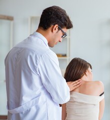 Doctor examining the skin of female patient