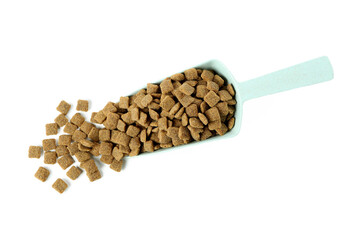 Scoop with animal feed isolated on white background