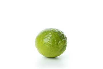 Fresh single lime isolated on white background