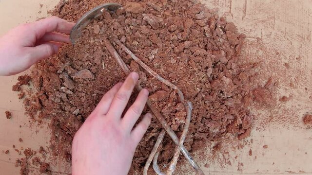 Collected scale that was removed from the boiler and the heater that was damaged by hard water 