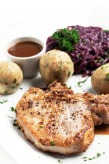 german style grilled pork chop with bread dumplings traditional meal