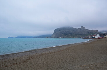 An empty beach in the bay of a small resort town, Crimea.