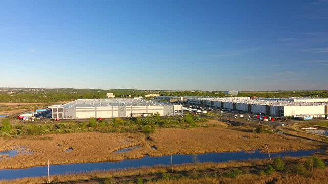 Aerial Distant View of Giant Amazon Fulfillment Center Warehouses - Part 3