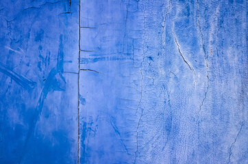 weathered wood planks wall in blue color