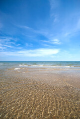 sandy sea and blue clouds. Castro beach, Turkey.