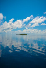 Naklejka na ściany i meble reflections from the sky in the maldives 