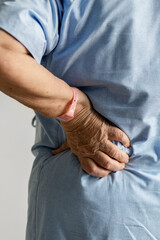 Fototapeta premium Elderly woman with back pain