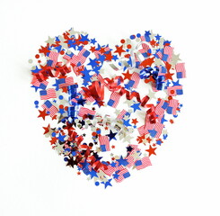 4th of July USA Independence Day confetti heart decorations american flag colors top view isolated.  Celebration memorial day in America.