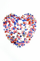 4th of July USA Independence Day confetti heart decorations american flag colors top view isolated.  Celebration memorial day in America.