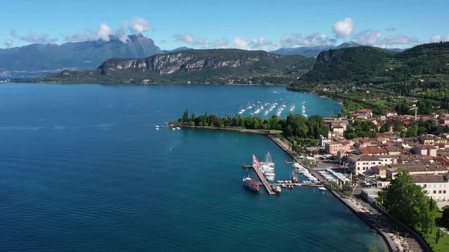 Top view of the historic part of the city of Bardolino on the coastline of Lake Garda. Aerial view of Bardolino, Lake Garda, Italy. Panorama of the historic town of Bardolino.	