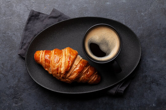 Espresso coffee and croissant for breakfast