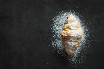 Naklejka premium Fresh pastries on the table. French flavored croissant.