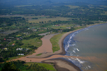 Fototapeta na wymiar aerial view of the beach, village and river