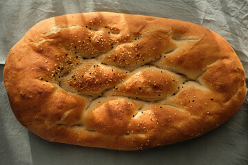 Close-up sesame and black cumin ramadan pita