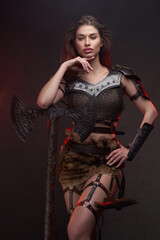 Barbaric woman viking with hand under her chin