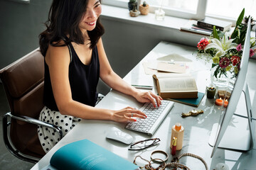 A woman working happily