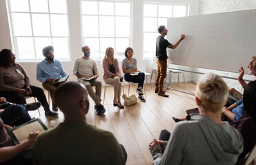 Man presenting at a seminar