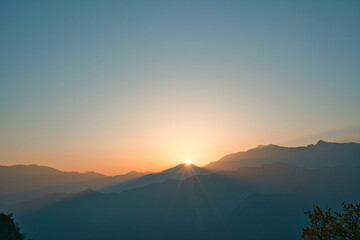 Sunrise view of Alishan, the sky is orange.Train, cherry blossom, tree, cloud. Various views of...