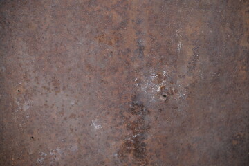 Background texture of Rusted steel. Scratches, abrasions, paint. Signs of wear and tear