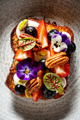Brioche with butter and fruits