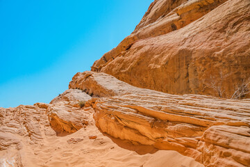 Valley of Fire National Park in Nevada. Orange amazing landscape, stones of different shapes and a fire wave
