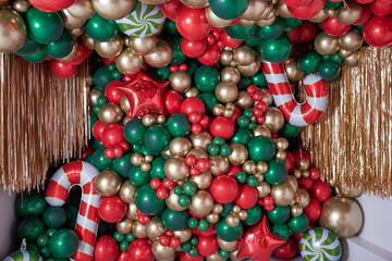 christmas decorations with colored balloons on background