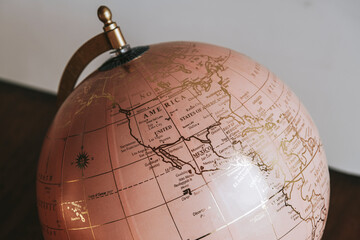 Pink globe sphere in a room - obrazy, fototapety, plakaty