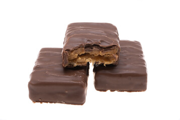 chocolate candies with caramel and nuts isolated