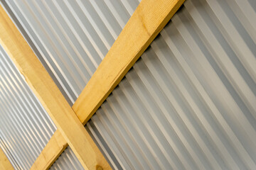 wooden beam and metal profile abstract background
