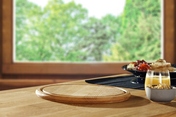 Obraz premium Desk of free space and kitchen interior with window 