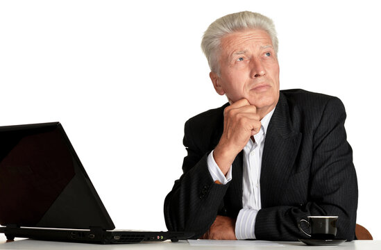 Old Businessman Working With Laptop Isolated On White Background