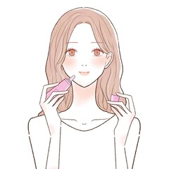 リップクリームを塗る女性