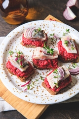 herring appetizer. Herring with beets on rye bread. Brain food concept. Home cooking