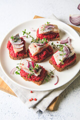 herring appetizer. Herring with beets on rye bread. Brain food concept. Home cooking