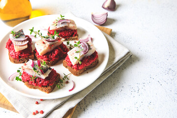 herring appetizer. Herring with beets on rye bread. Brain food concept. Home cooking