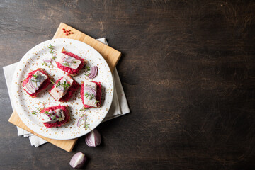 herring appetizer. Herring with beets on rye bread. Brain food concept. Home cooking