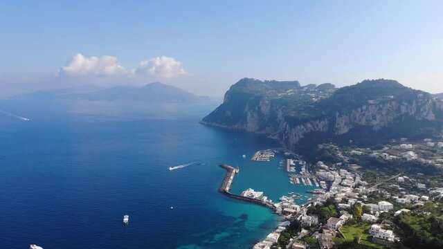 Aerial drone view to Capri island. Tyrrhenian Sea, coastline, Italy