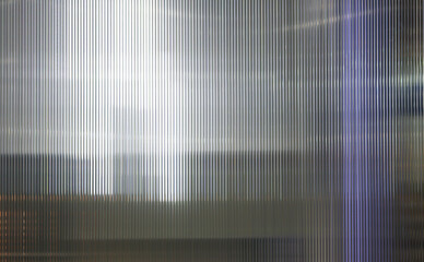 Polycarbonate translucent pattern texture background in dark light.