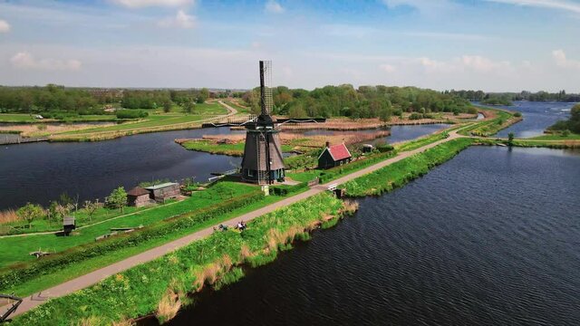 Nature park Het Twiske typical dutch nature scene with historical wind mill in The Netherlands