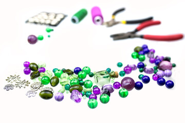 Jewellery suppliers, beads and jewellery findings of different kinds isolated on a white background.