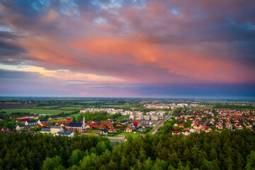 Aerial landscape of small village in Poland at sunset.