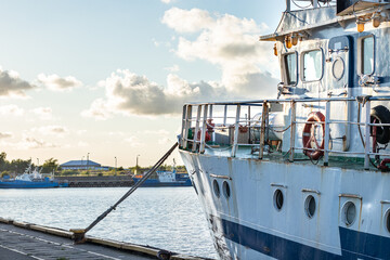 a fishing boat moored at the docks