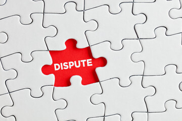 The word dispute written on red missing puzzle piece. To discover the hidden dispute
