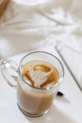 Pancakes with peaches, blueberries and banana in a cozy setting 