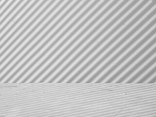 Gray background for product presentation with stripes of light and shadow