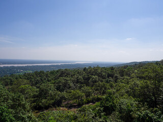 Fototapeta na wymiar Amazing bird's-eye view mountain scenery of summer, blue sky, forest near .Mekong River in Thailand.
